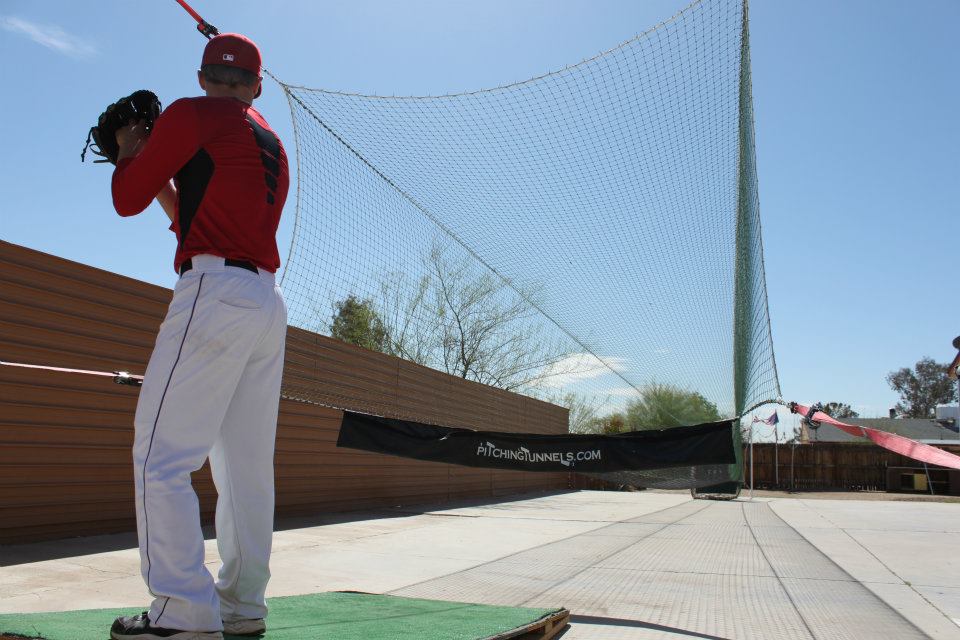 Adult baseball training session with MADE coach