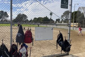Young baseball player practicing mindset and hustle during MADE Baseball training